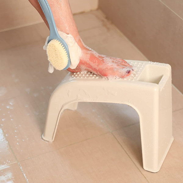 Shower stool outlet for shaving legs